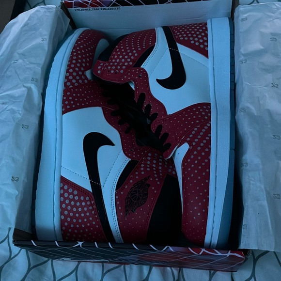 I am selling the Air Jordan 1 Retro High Orgin Story Spider-Man shoes